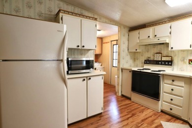 Looking to escape the cold winter weather? Enjoy all that on Lake Fairways Country Club in Florida - for sale on GolfHomes.com, golf home, golf lot