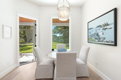 Welcome to 228 Mattie's Way, an extraordinary lakefront retreat on Kelly Plantation Golf Club in Florida - for sale on GolfHomes.com, golf home, golf lot