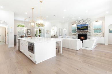 Welcome to 228 Mattie's Way, an extraordinary lakefront retreat on Kelly Plantation Golf Club in Florida - for sale on GolfHomes.com, golf home, golf lot