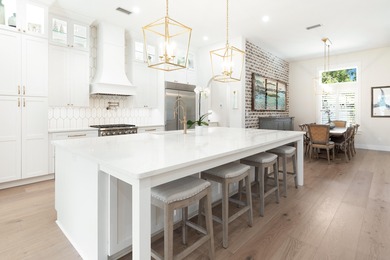 Welcome to 228 Mattie's Way, an extraordinary lakefront retreat on Kelly Plantation Golf Club in Florida - for sale on GolfHomes.com, golf home, golf lot