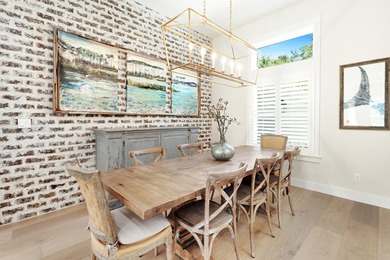 Welcome to 228 Mattie's Way, an extraordinary lakefront retreat on Kelly Plantation Golf Club in Florida - for sale on GolfHomes.com, golf home, golf lot