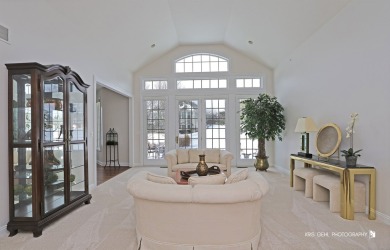 Located on a corner lot, this stunning 2-bedroom ranch home on The Merit Club in Illinois - for sale on GolfHomes.com, golf home, golf lot