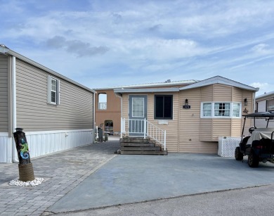 Charming 2BR/1BA beach bungalow on Nettles Island in Jensen on Island Dunes Country Club in Florida - for sale on GolfHomes.com, golf home, golf lot