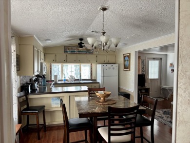 Charming 2BR/1BA beach bungalow on Nettles Island in Jensen on Island Dunes Country Club in Florida - for sale on GolfHomes.com, golf home, golf lot