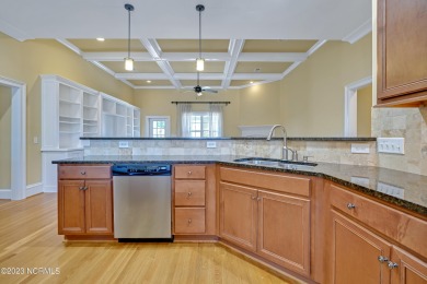 A custom-built brick home by Jernigan Homes located on a corner on Cape Fear National At Brunswick Forest in North Carolina - for sale on GolfHomes.com, golf home, golf lot