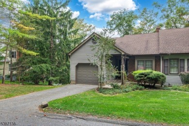 Freshly painted 3-bedroom, den & 3-bath end-unit townhouse on Panther Valley Golf and Country Club in New Jersey - for sale on GolfHomes.com, golf home, golf lot