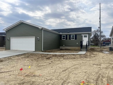 Brand new great room ranch backing to Kearsley Park and Golf on Kearsley Lake Golf Course in Michigan - for sale on GolfHomes.com, golf home, golf lot