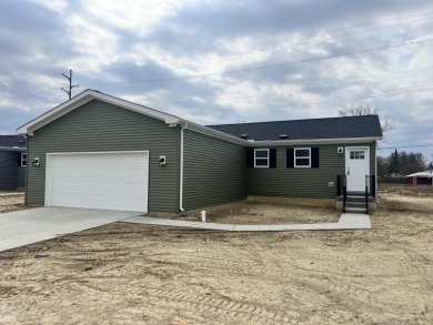Brand new great room ranch backing to Kearsley Park and Golf on Kearsley Lake Golf Course in Michigan - for sale on GolfHomes.com, golf home, golf lot