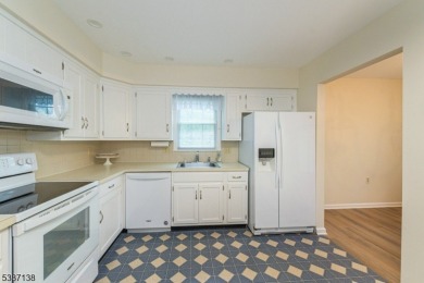 Freshly painted 3-bedroom, den & 3-bath end-unit townhouse on Panther Valley Golf and Country Club in New Jersey - for sale on GolfHomes.com, golf home, golf lot