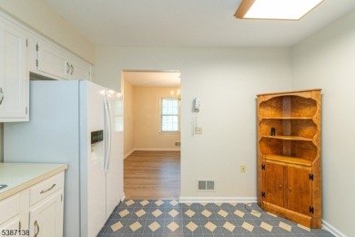 Freshly painted 3-bedroom, den & 3-bath end-unit townhouse on Panther Valley Golf and Country Club in New Jersey - for sale on GolfHomes.com, golf home, golf lot