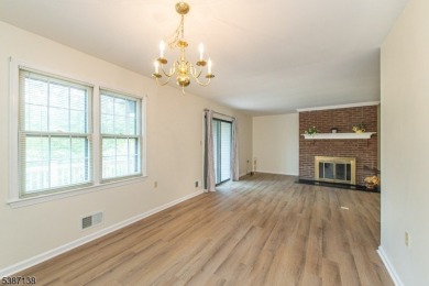 Freshly painted 3-bedroom, den & 3-bath end-unit townhouse on Panther Valley Golf and Country Club in New Jersey - for sale on GolfHomes.com, golf home, golf lot