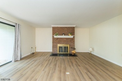 Freshly painted 3-bedroom, den & 3-bath end-unit townhouse on Panther Valley Golf and Country Club in New Jersey - for sale on GolfHomes.com, golf home, golf lot