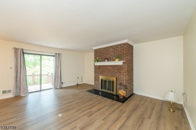 Freshly painted 3-bedroom, den & 3-bath end-unit townhouse on Panther Valley Golf and Country Club in New Jersey - for sale on GolfHomes.com, golf home, golf lot