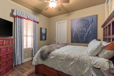 Tucked away on a quiet cul-de-sac and overlooking the #6 green on The Club At Comanche Trace in Texas - for sale on GolfHomes.com, golf home, golf lot