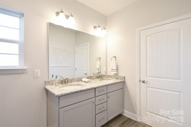 Discover exceptional living in this nearly new home on Red Bridge Golf and Country Club in North Carolina - for sale on GolfHomes.com, golf home, golf lot