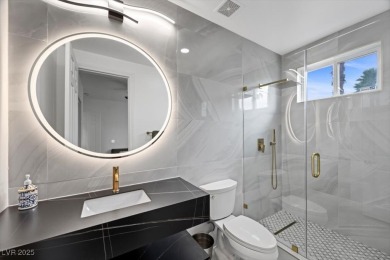 This newly renovated home offers breathtaking views of the golf on South Shore At Lake Las Vegas in Nevada - for sale on GolfHomes.com, golf home, golf lot
