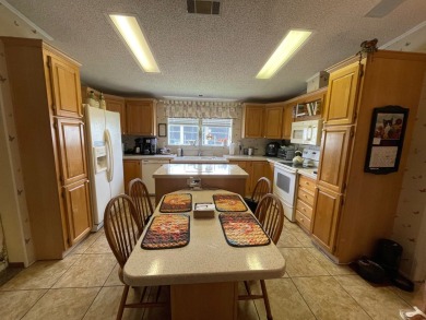 Listed by the Official Sales Team of Cypress Lakes Village on Big Cypress Golf and Country Club in Florida - for sale on GolfHomes.com, golf home, golf lot