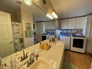 Listed by the Official Sales Team of Cypress Lakes Village on Big Cypress Golf and Country Club in Florida - for sale on GolfHomes.com, golf home, golf lot