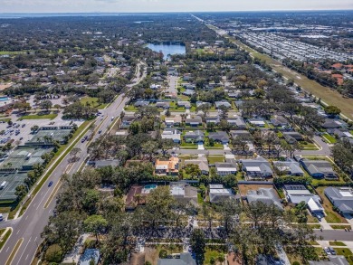 Welcome to a stunning residence in the highly sought after on Countryside Country Club in Florida - for sale on GolfHomes.com, golf home, golf lot