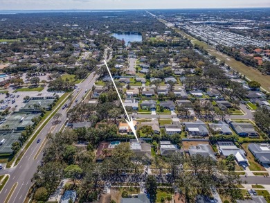 Welcome to a stunning residence in the highly sought after on Countryside Country Club in Florida - for sale on GolfHomes.com, golf home, golf lot