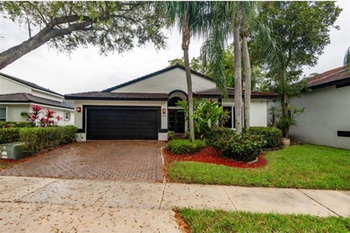 Fall in love instantly with this beautifully renovated lakefront on Grand Palms Hotel and Golf Resort in Florida - for sale on GolfHomes.com, golf home, golf lot