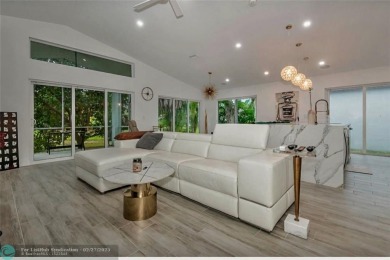 Fall in love instantly with this beautifully renovated lakefront on Grand Palms Hotel and Golf Resort in Florida - for sale on GolfHomes.com, golf home, golf lot