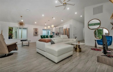 Fall in love instantly with this beautifully renovated lakefront on Grand Palms Hotel and Golf Resort in Florida - for sale on GolfHomes.com, golf home, golf lot