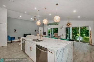 Fall in love instantly with this beautifully renovated lakefront on Grand Palms Hotel and Golf Resort in Florida - for sale on GolfHomes.com, golf home, golf lot