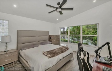 Fall in love instantly with this beautifully renovated lakefront on Grand Palms Hotel and Golf Resort in Florida - for sale on GolfHomes.com, golf home, golf lot