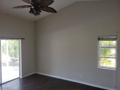 Welcome to this exceptional 3-bedroom, 2.5-bath pool home on Royal Tee Country Club in Florida - for sale on GolfHomes.com, golf home, golf lot