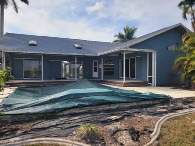 Welcome to this exceptional 3-bedroom, 2.5-bath pool home on Royal Tee Country Club in Florida - for sale on GolfHomes.com, golf home, golf lot