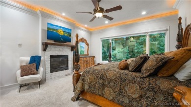 Unparalleled luxury and privacy with this beautifully remodeled on The Club At Porto Cima in Missouri - for sale on GolfHomes.com, golf home, golf lot