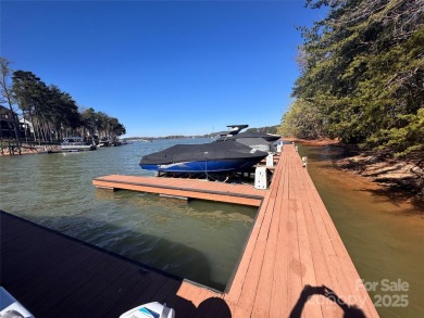 Don't let summer slip away! Discover the joys of lake living in on Trump National Golf Club Charlotte in North Carolina - for sale on GolfHomes.com, golf home, golf lot