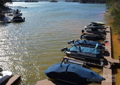 Don't let summer slip away! Discover the joys of lake living in on Trump National Golf Club Charlotte in North Carolina - for sale on GolfHomes.com, golf home, golf lot