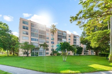 Charming 4th floor unit in elevator building. Wonderful Lake on Marina Lakes Golf Course in Florida - for sale on GolfHomes.com, golf home, golf lot