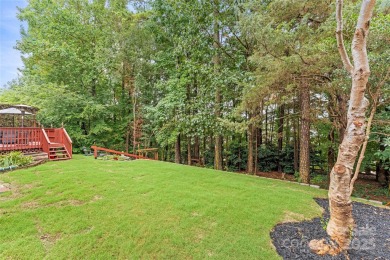Fall in love with this stunning 5BR, 2.5BA gem in coveted on Highland Creek Golf Club in North Carolina - for sale on GolfHomes.com, golf home, golf lot