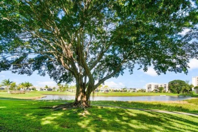 Charming 4th floor unit in elevator building. Wonderful Lake on Marina Lakes Golf Course in Florida - for sale on GolfHomes.com, golf home, golf lot