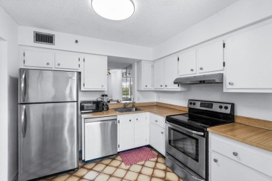 Charming 4th floor unit in elevator building. Wonderful Lake on Marina Lakes Golf Course in Florida - for sale on GolfHomes.com, golf home, golf lot