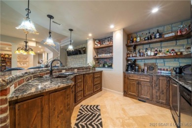 Unparalleled luxury and privacy with this beautifully remodeled on The Club At Porto Cima in Missouri - for sale on GolfHomes.com, golf home, golf lot