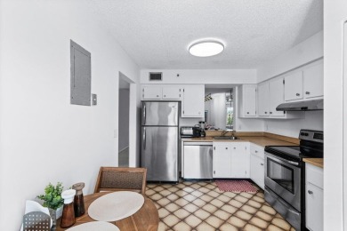 Charming 4th floor unit in elevator building. Wonderful Lake on Marina Lakes Golf Course in Florida - for sale on GolfHomes.com, golf home, golf lot