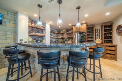 Unparalleled luxury and privacy with this beautifully remodeled on The Club At Porto Cima in Missouri - for sale on GolfHomes.com, golf home, golf lot