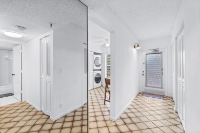 Charming 4th floor unit in elevator building. Wonderful Lake on Marina Lakes Golf Course in Florida - for sale on GolfHomes.com, golf home, golf lot