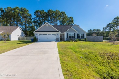 Welcome home to this beautifully maintained 3-bedroom, 2-bath on North Shore Country Club in North Carolina - for sale on GolfHomes.com, golf home, golf lot