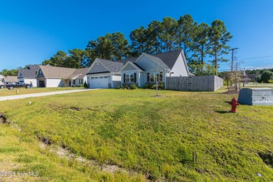 Welcome home to this beautifully maintained 3-bedroom, 2-bath on North Shore Country Club in North Carolina - for sale on GolfHomes.com, golf home, golf lot