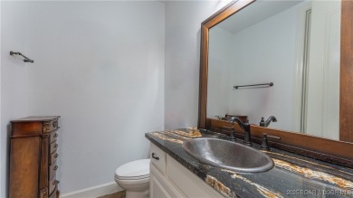 Unparalleled luxury and privacy with this beautifully remodeled on The Club At Porto Cima in Missouri - for sale on GolfHomes.com, golf home, golf lot