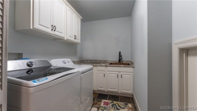 Unparalleled luxury and privacy with this beautifully remodeled on The Club At Porto Cima in Missouri - for sale on GolfHomes.com, golf home, golf lot