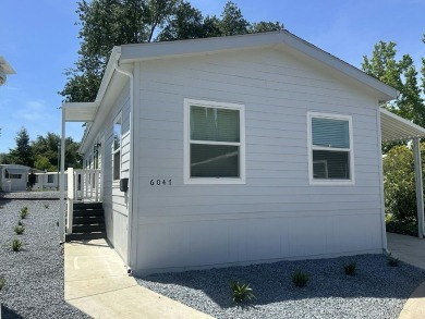 This beautiful 3 bedroom with 2 bathroom home is centrally on Foothills Golf Center in California - for sale on GolfHomes.com, golf home, golf lot