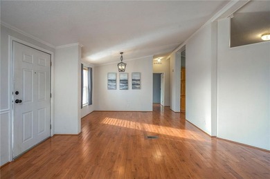 Nestled on a large corner lot, this well-maintained 3-bed on Linn Valley Lakes - Deer Trace Golf Course in Kansas - for sale on GolfHomes.com, golf home, golf lot