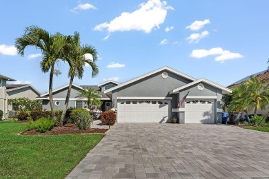 Discover luxury coastal living at its finest in this fully on Apollo Beach Golf and Sea Club in Florida - for sale on GolfHomes.com, golf home, golf lot