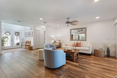 Discover luxury coastal living at its finest in this fully on Apollo Beach Golf and Sea Club in Florida - for sale on GolfHomes.com, golf home, golf lot